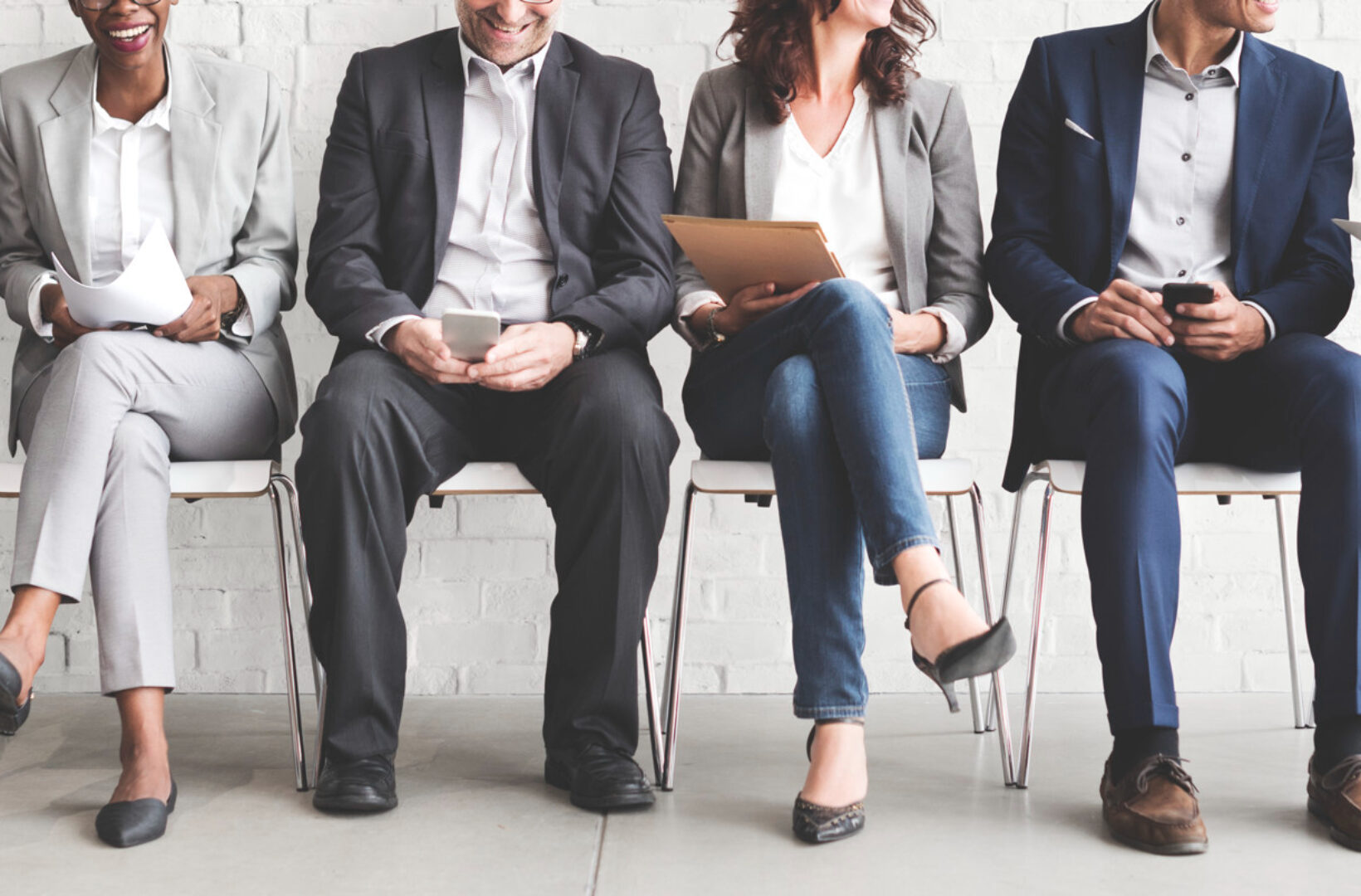 Candidats en attente à un entretien de recrutement de cadre